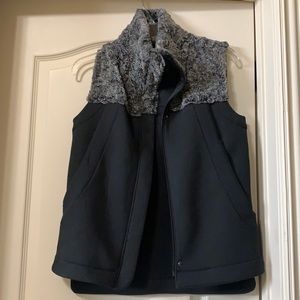North Face Hybrination fur vest , has slit pockets!